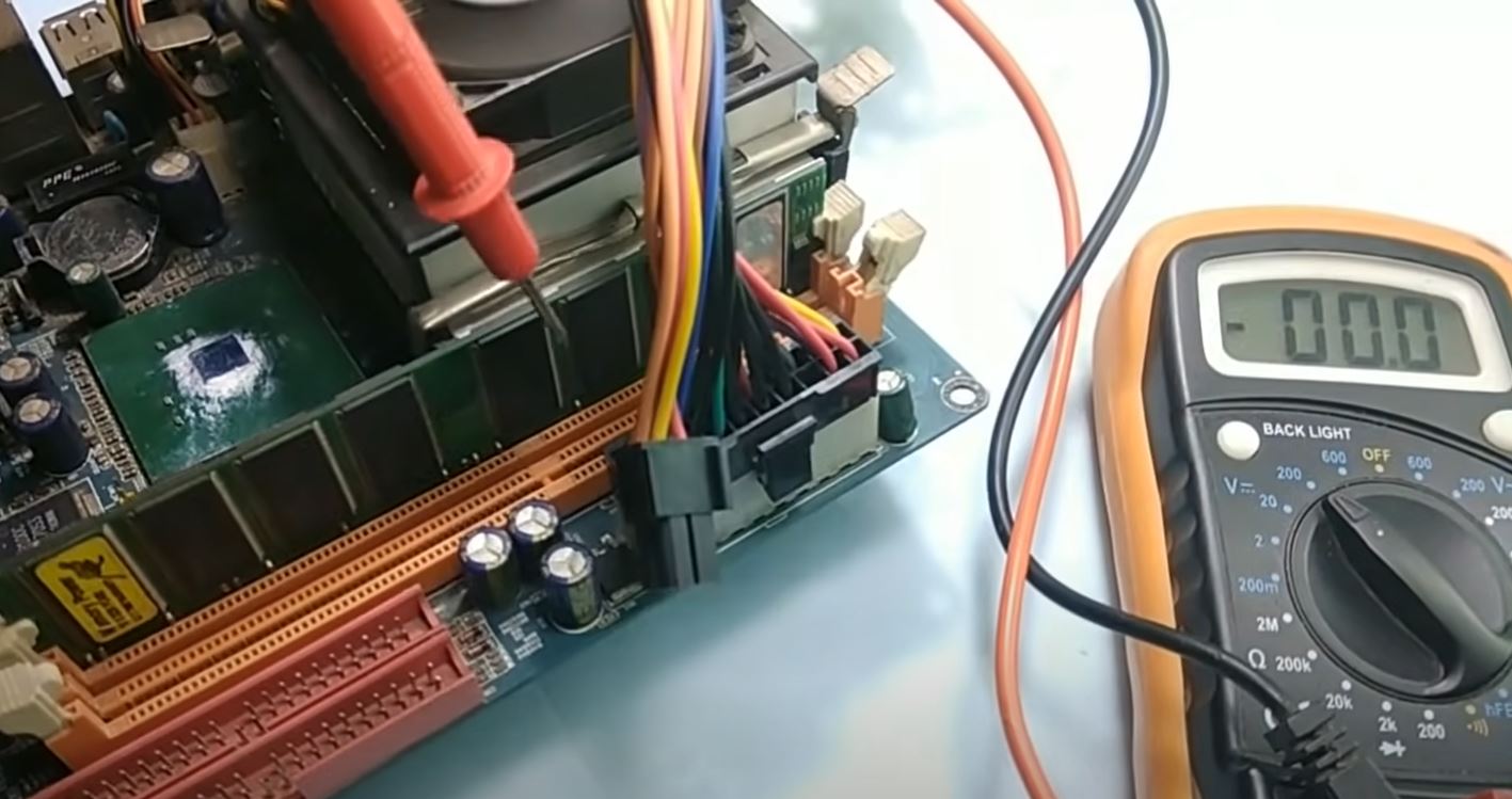 using a multimeter to test motherboard voltage
