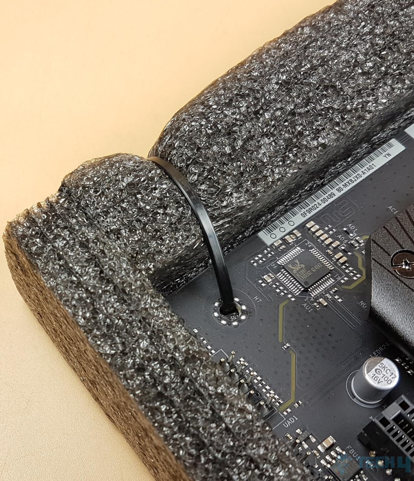 ASRock Z790 PG Riptide — Zip Ties to secure the motherboard