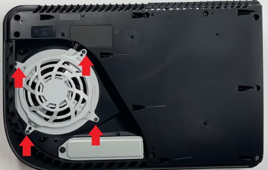 The screws holding the PS5 fan case.