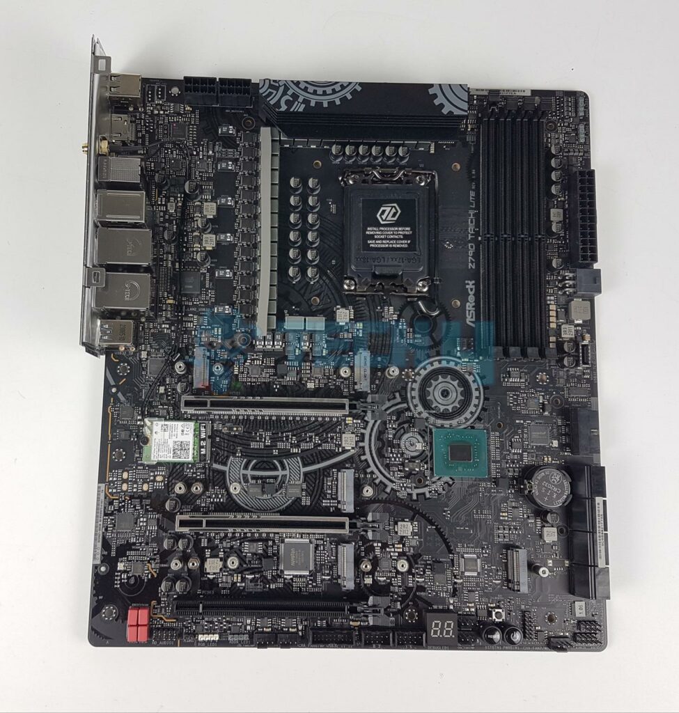 Motherboard With CPU, Heatsink, And RAM Removed