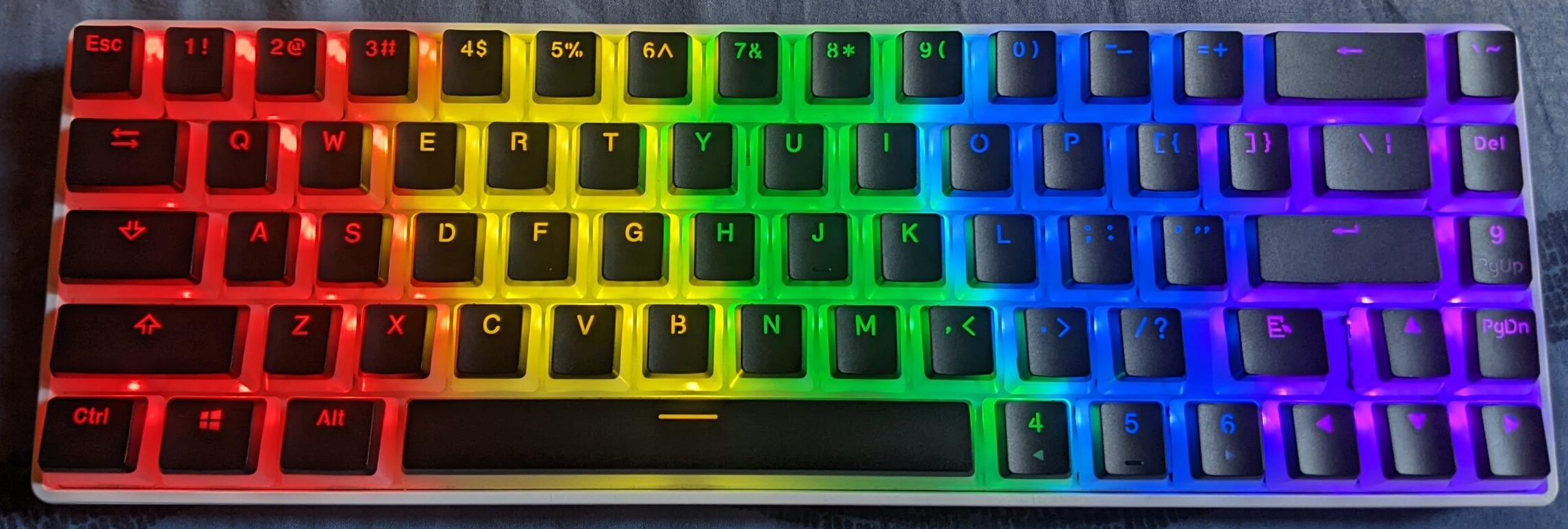 What I'm currently using, i.e., a 60% wireless mechanical keyboard from Havit, modified with Redragon Scarab A130 Pudding Keycaps in Black. Ain't that a beauty? (Image Credits - Tech4Gamers)