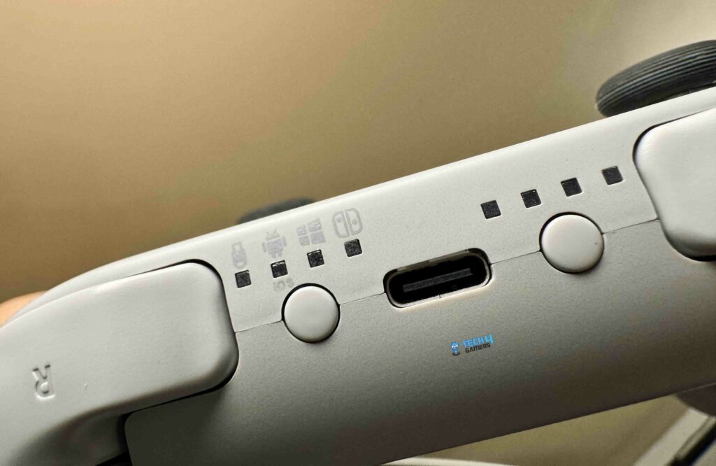 Mode Button, Player Number LED, and USB-C Port